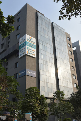 Nephrocare India building with a sign on it.