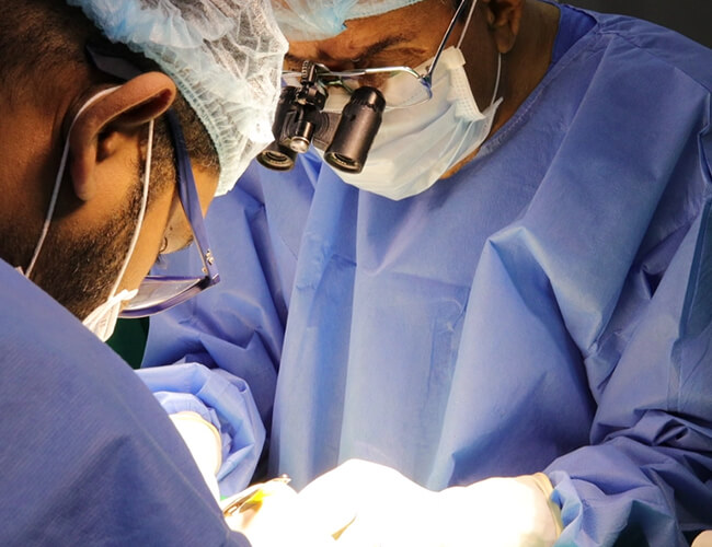 A close-up of a doctor performing a surgery